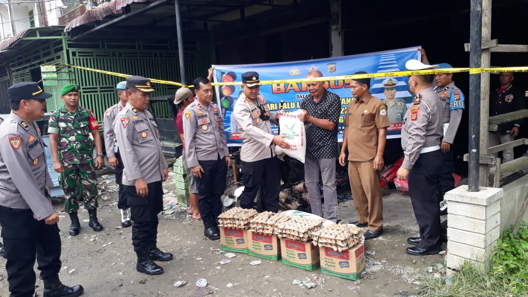 Kapolres Aceh Tenggara Bantu Korban Kebakaran di Lawe Rutung